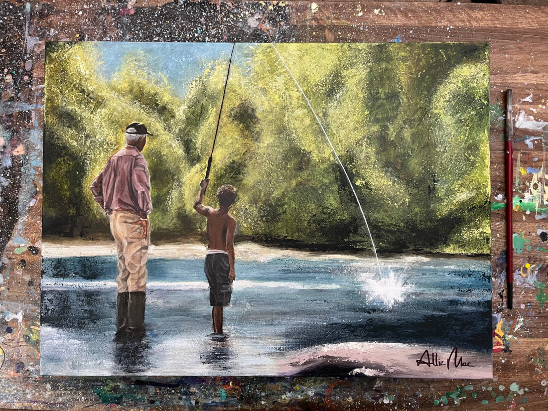 A grandfather and young boy stand together in a quiet river while fishing beneath glowing green trees in “Teach a Man to Fish” by Allison Victoria, an impressionistic mixed media and oil painting about mentorship, faith, wisdom, and generational love.