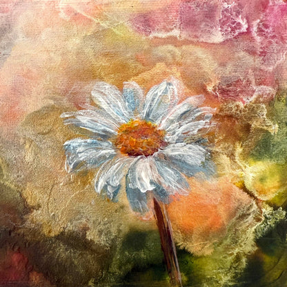 Artistic depiction of a daisy flower with a textured, multicolored background close up shot to show texture and detail