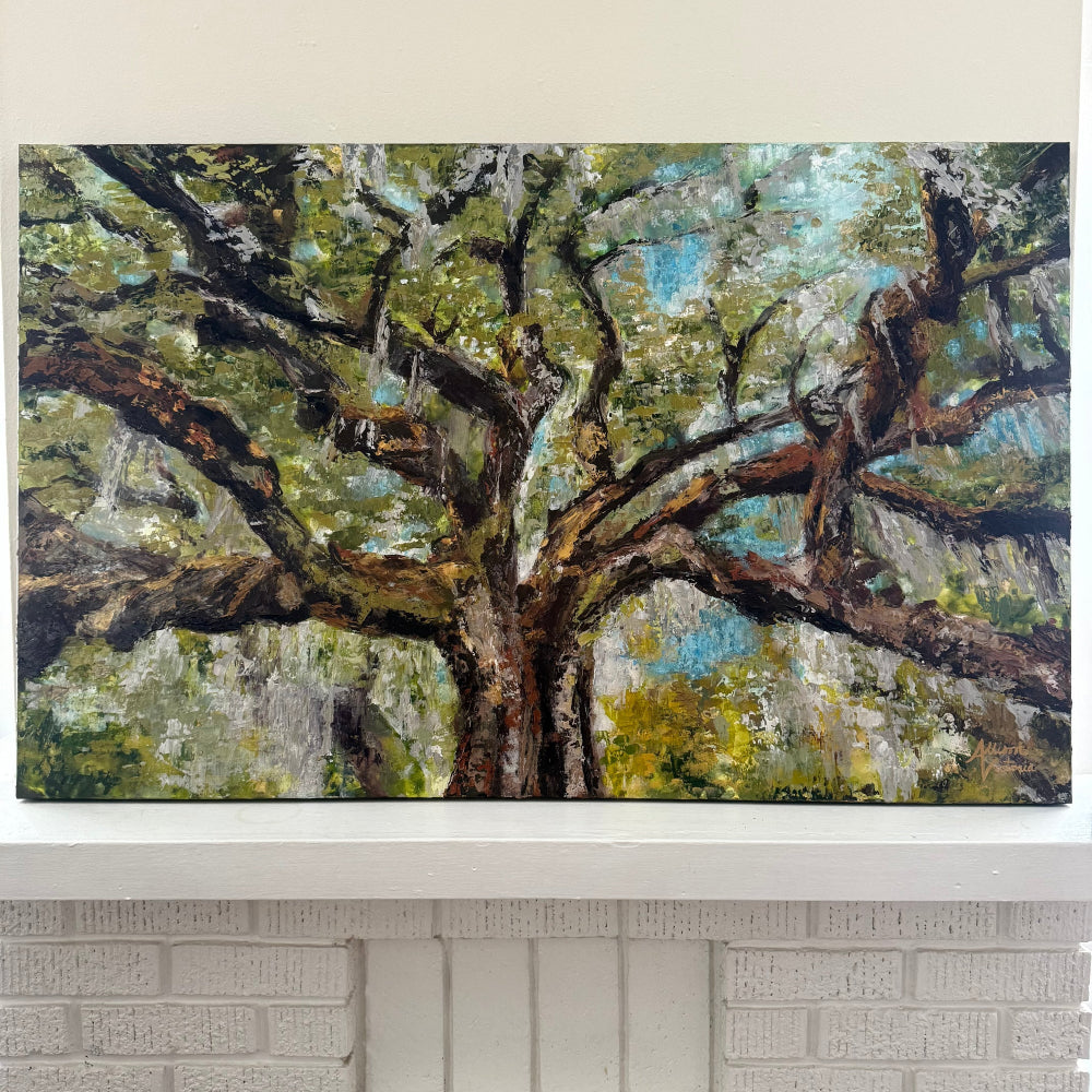 Painting of a large oak tree, "the tree of life" in New Orleans, Louisiana, with sprawling branches on a white wall.