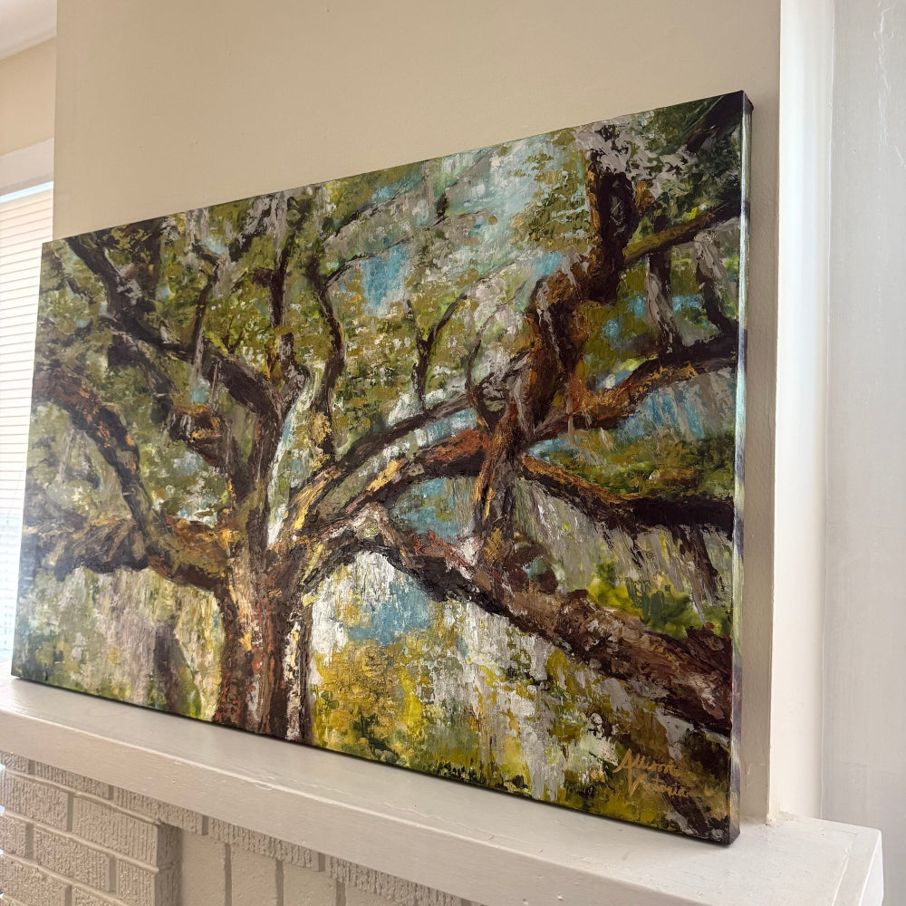 Painting of a tree with green leaves and brown branches with Spanish moss palette knife style on a white mantle