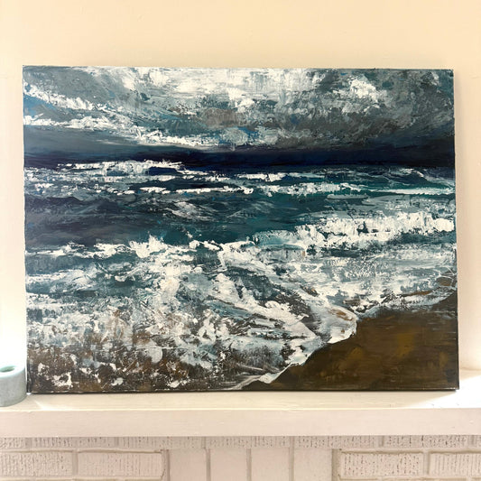 Abstract palette knife painting with blue and white tones on a beige wall on mantle 