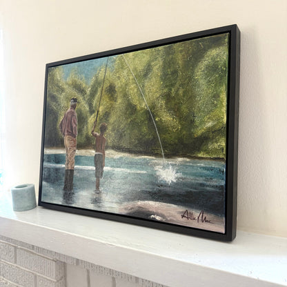 Teach a Man to Fish” by Allison Victoria — an impressionistic mixed media and oil painting of a grandfather teaching his grandson to fish in a peaceful river surrounded by glowing green trees and soft sunlight. The painting captures mentorship, discipleship, generational wisdom, faith, and the beauty of quiet childhood memories.