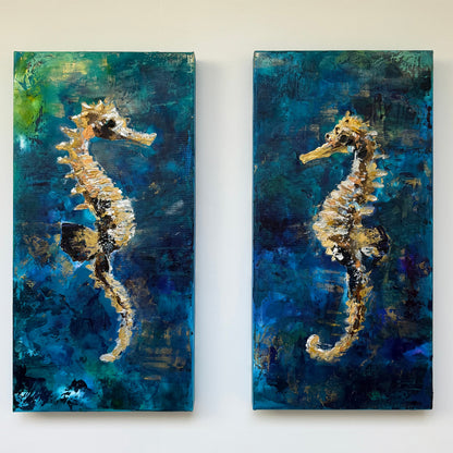 Two paintings of seahorses on a textured blue and green background.